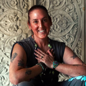 Joey, E-RYT 500 yoga instructor and sound healer at The Yoga Barre LWR and The Yoga Barre NRR – teaching restorative yoga, Reiki, and mindful movement for healing and renewal.