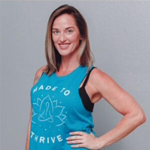 Sara Felger, LPN, LMT, RYT 200 – wellness professional and yoga instructor at The Yoga Barre LWR and The Yoga Barre NRR blending mindful movement, massage therapy, and holistic health.
